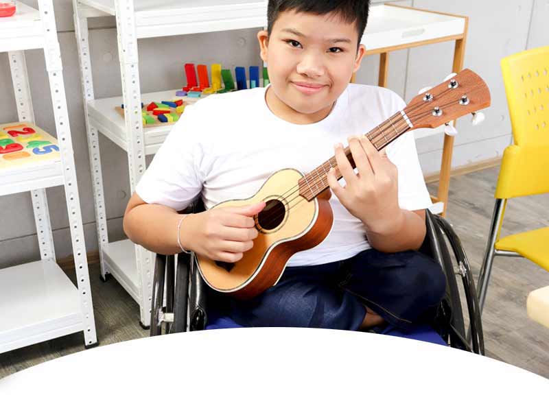 Disabled Boy Playing Guitar 
